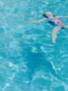 Floating in Swimming Pool